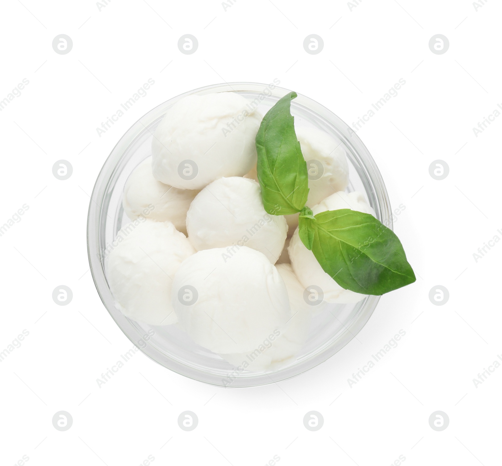 Photo of Bowl with mozzarella cheese balls and basil on white background, top view