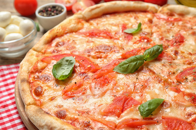 Delicious pizza Margherita on table, closeup view