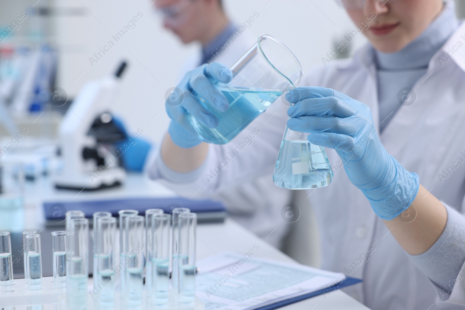 Photo of Scientists working with samples in laboratory. Medical research