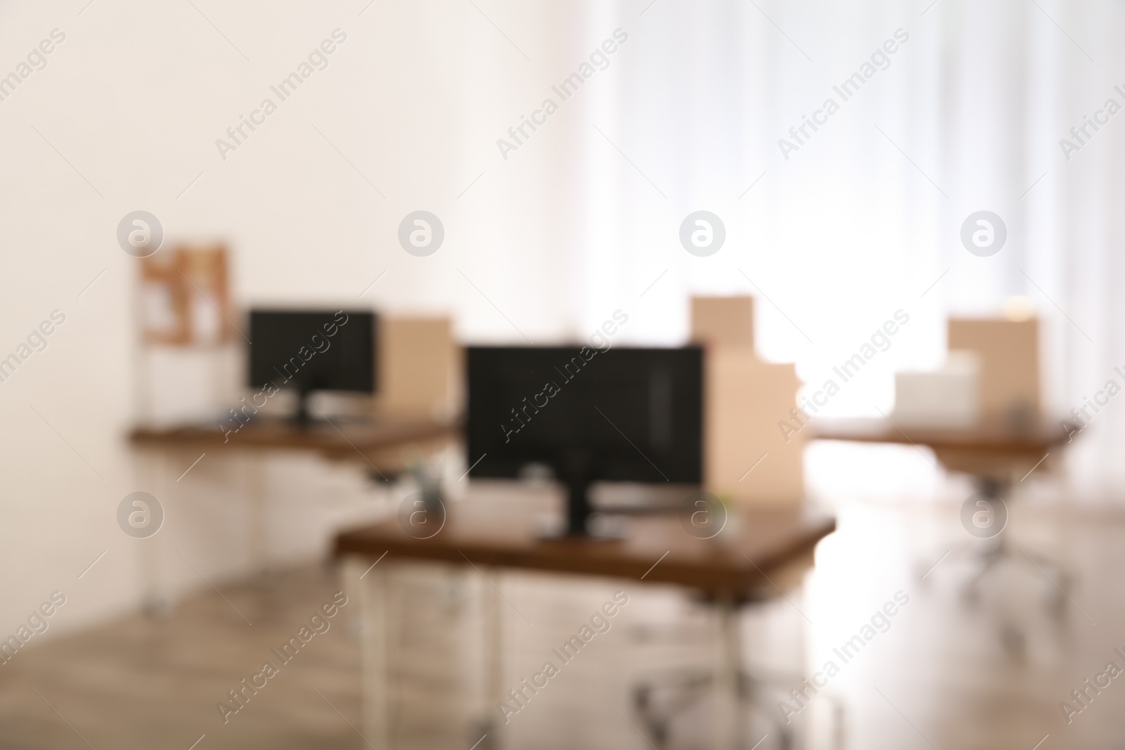 Photo of Modern brightly lit office with bokeh effect