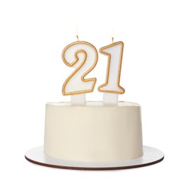 Photo of 21st birthday. Delicious cake with number shaped candles for coming of age party isolated on white