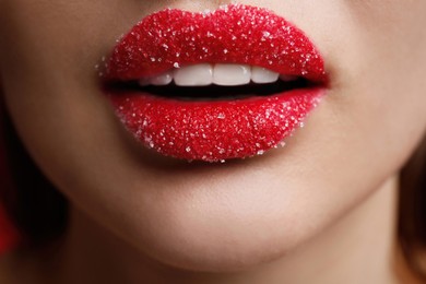 Photo of Closeup view of woman with lips covered in sugar