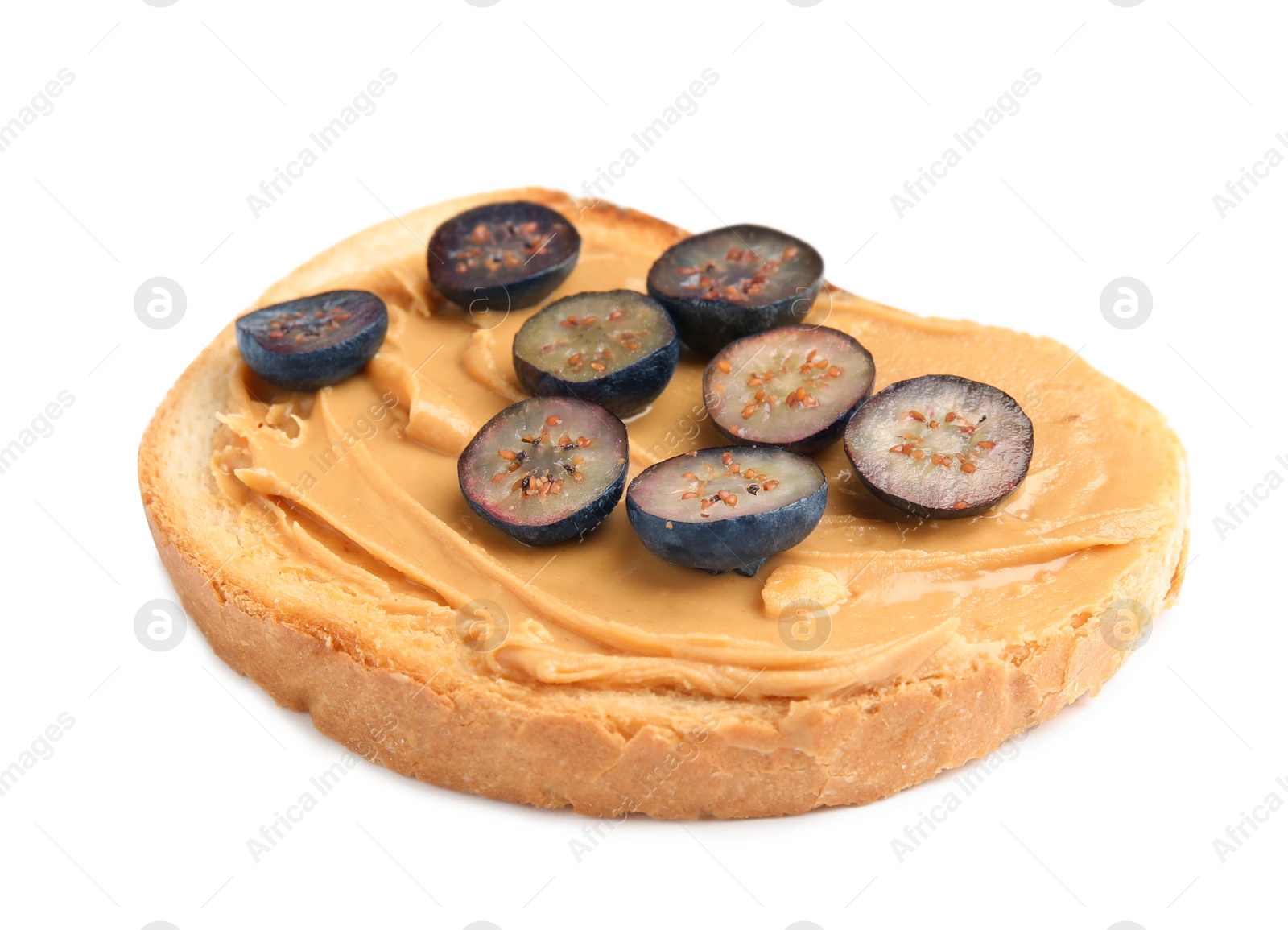 Photo of Slice of bread with peanut butter and blueberries on white background