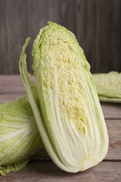 Fresh ripe Chinese cabbages on wooden table