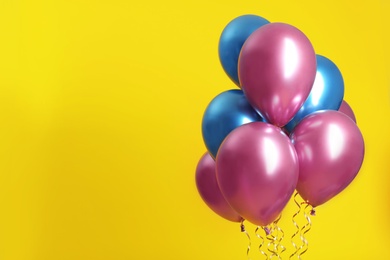 Bunch of balloons on color background. Space for text