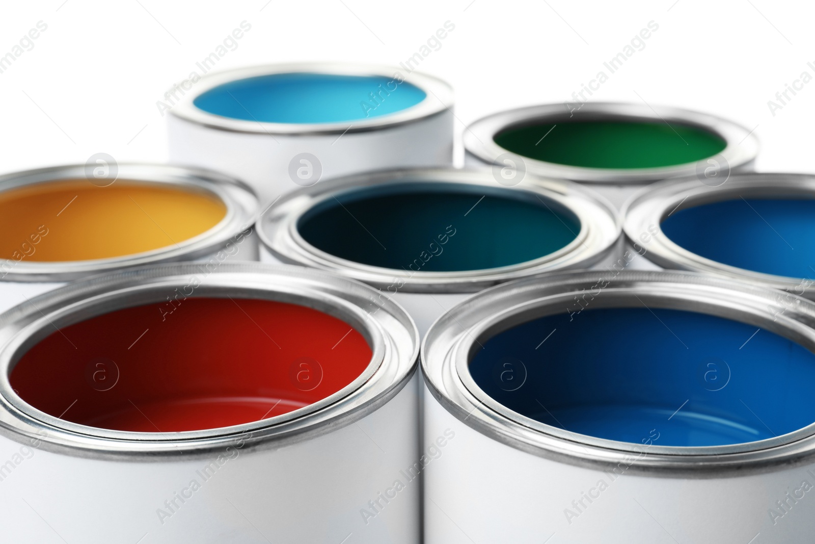 Photo of Open paint cans, closeup view. Professional material