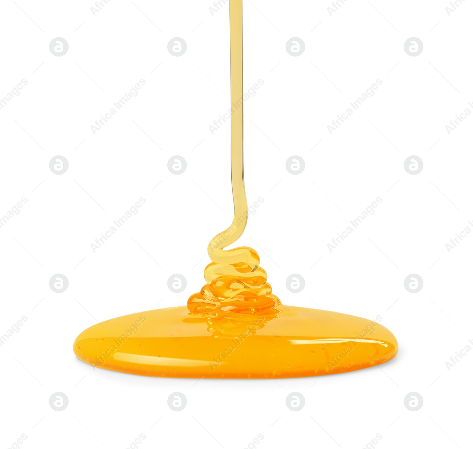 Photo of Pouring tasty natural honey isolated on white