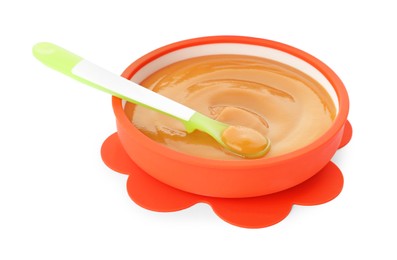 Photo of Bowl and spoon with tasty pureed baby food isolated on white