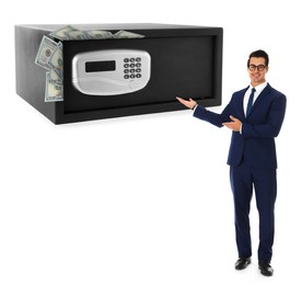 Image of Multiplying wealth, increasing savings. Confident businessman pointing at big steel safe full of money on white background
