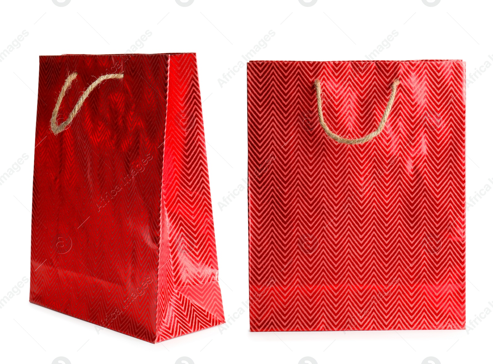 Image of Bright paper shopping bags on white background