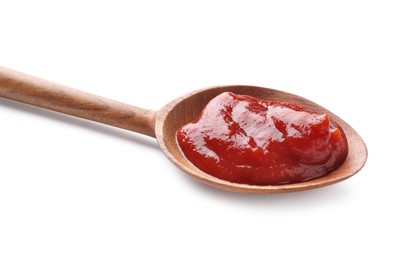 Tasty ketchup in wooden spoon isolated on white