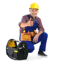 Photo of Electrician with tools wearing uniform on white background