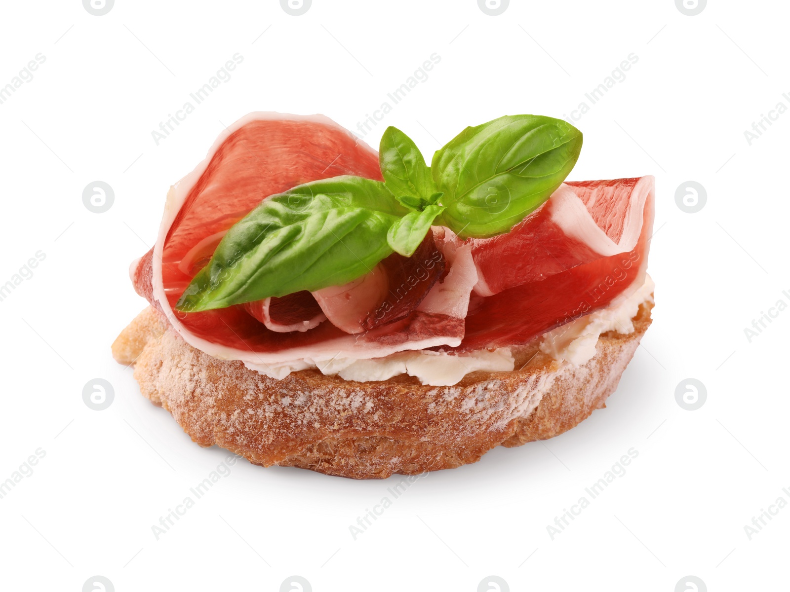 Photo of Tasty sandwich with cured ham and basil leaves isolated on white