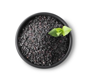 Photo of Black sesame seeds with green leaf in bowl on white background, top view