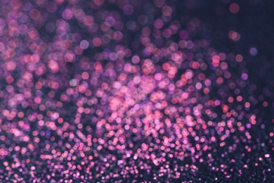 Magic pink bokeh effect on dark background