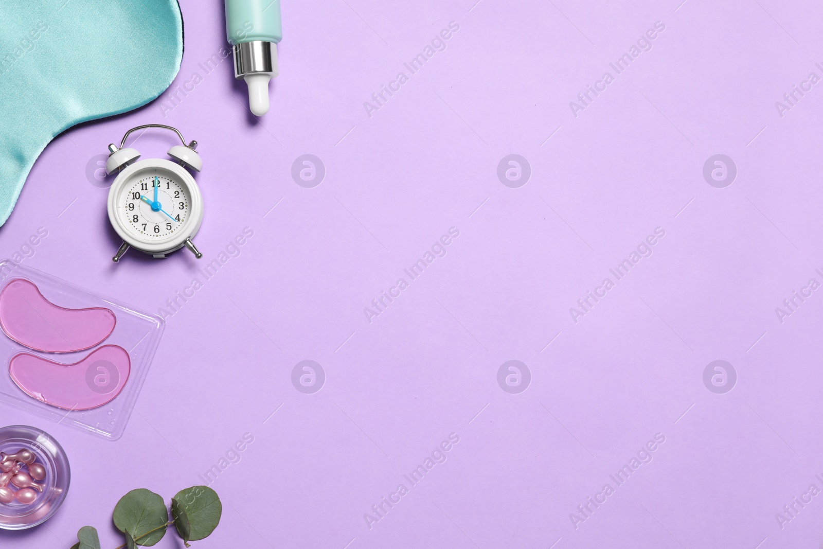 Photo of Flat lay composition with sleeping mask and skin care products on violet background. Space for text
