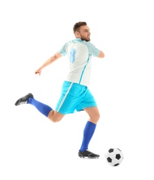 Young man playing football on white background