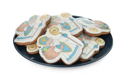 Photo of Tasty gingerbread cookies on white background. St. Nicholas Day celebration