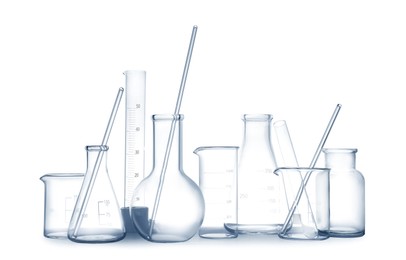 Empty clean laboratory glassware on white background