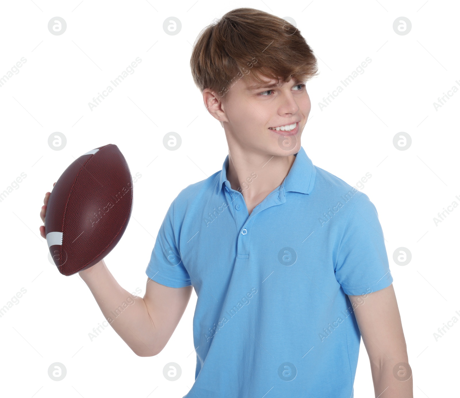 Photo of Teenage boy with american football ball on white background