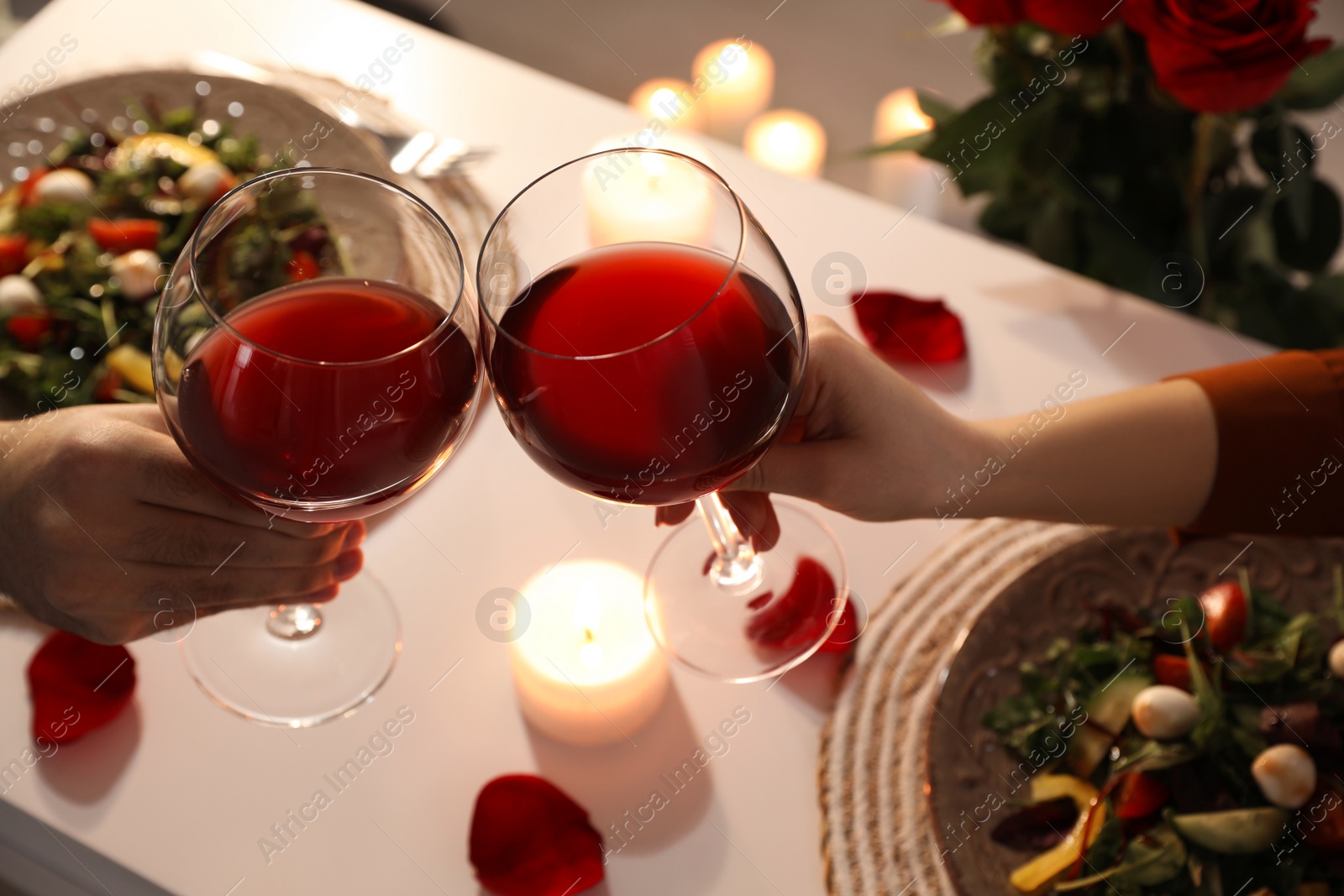 Photo of Couple having romantic dinner at home, above view