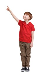 Photo of Little boy pointing at something on white background