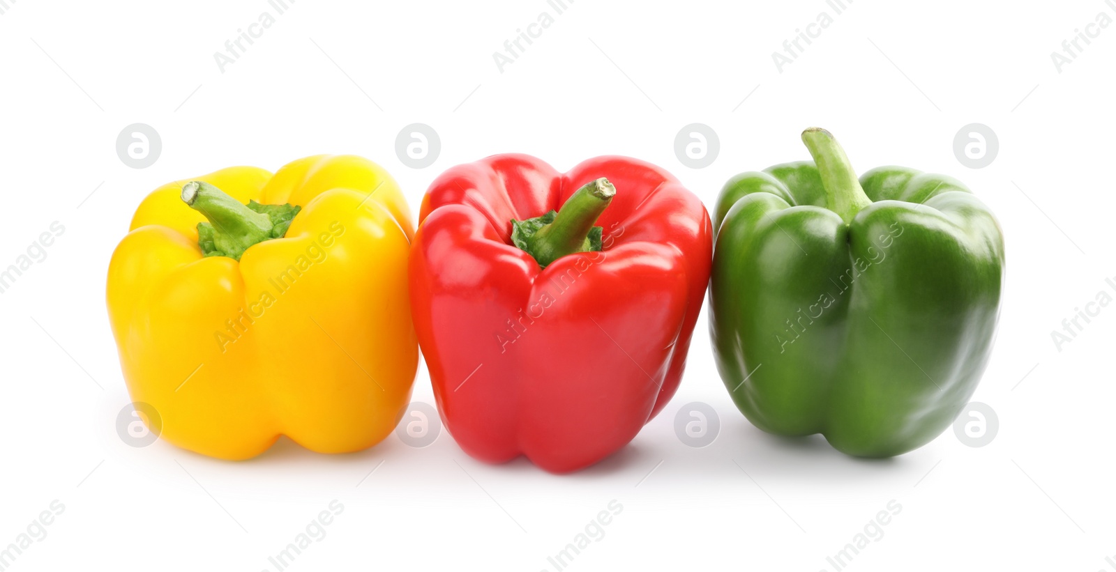 Photo of Fresh ripe colorful bell peppers isolated on white