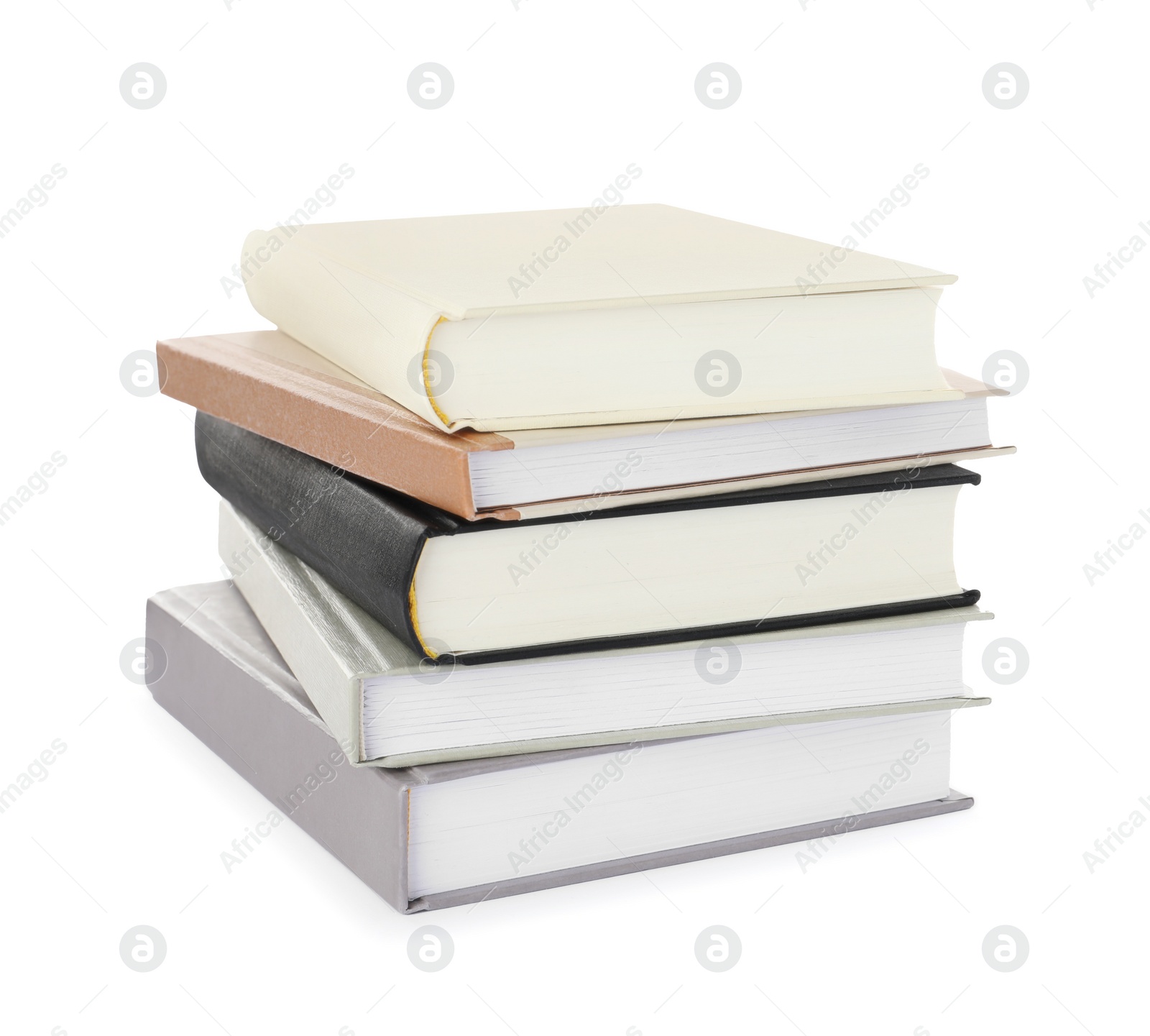 Photo of Many different books stacked on white background