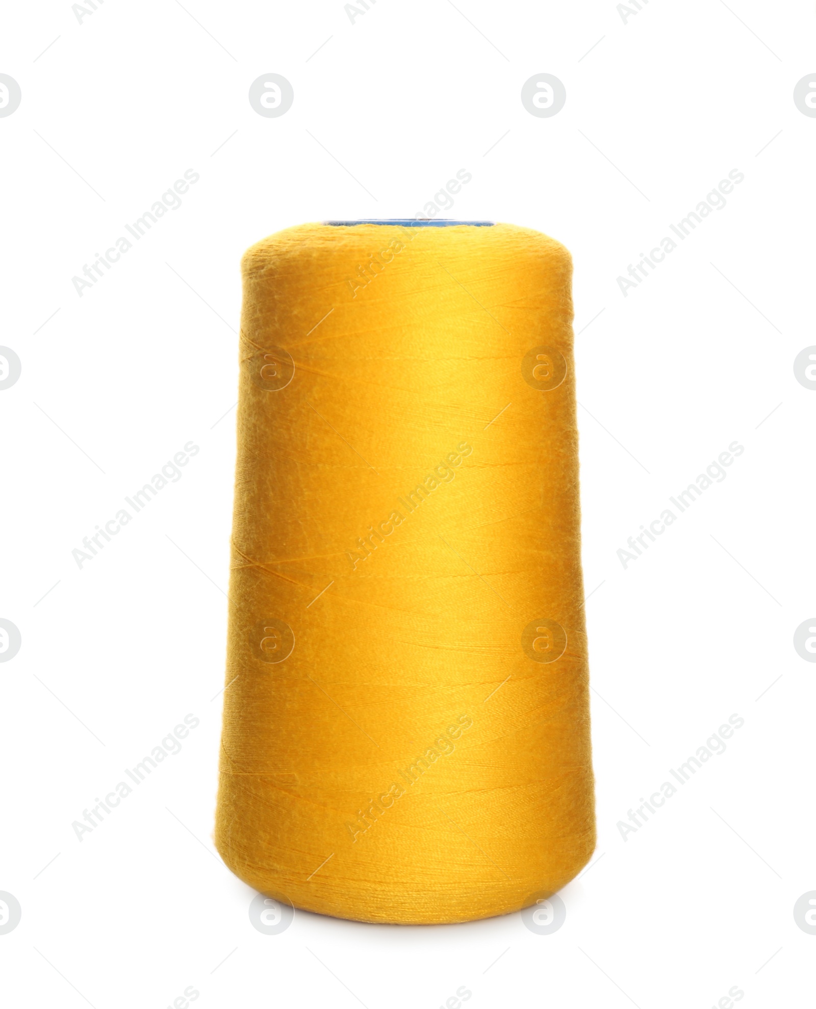 Photo of Spool of yellow sewing thread isolated on white