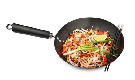 Shrimp stir fry with noodles and vegetables in wok isolated on white