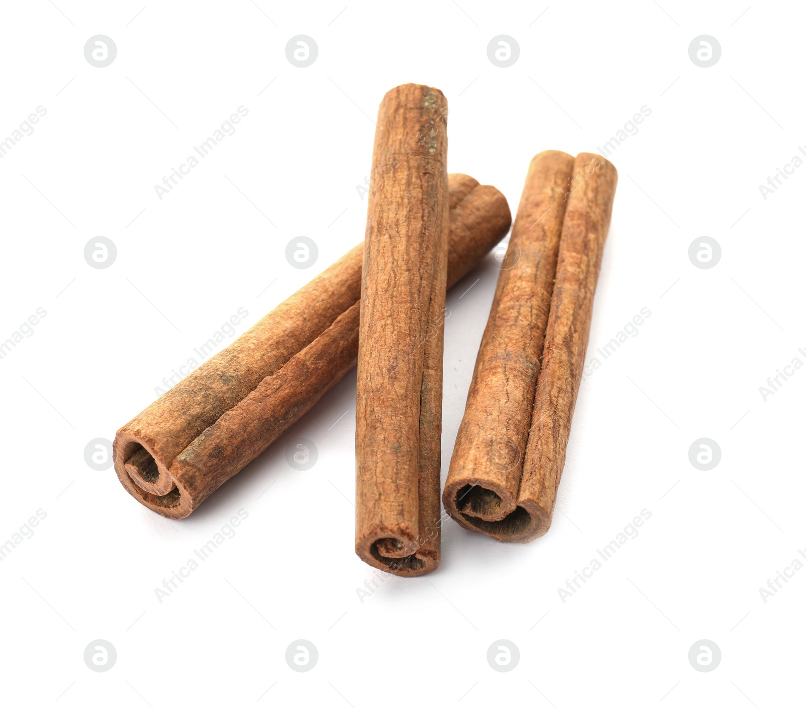 Photo of Aromatic cinnamon sticks on white background