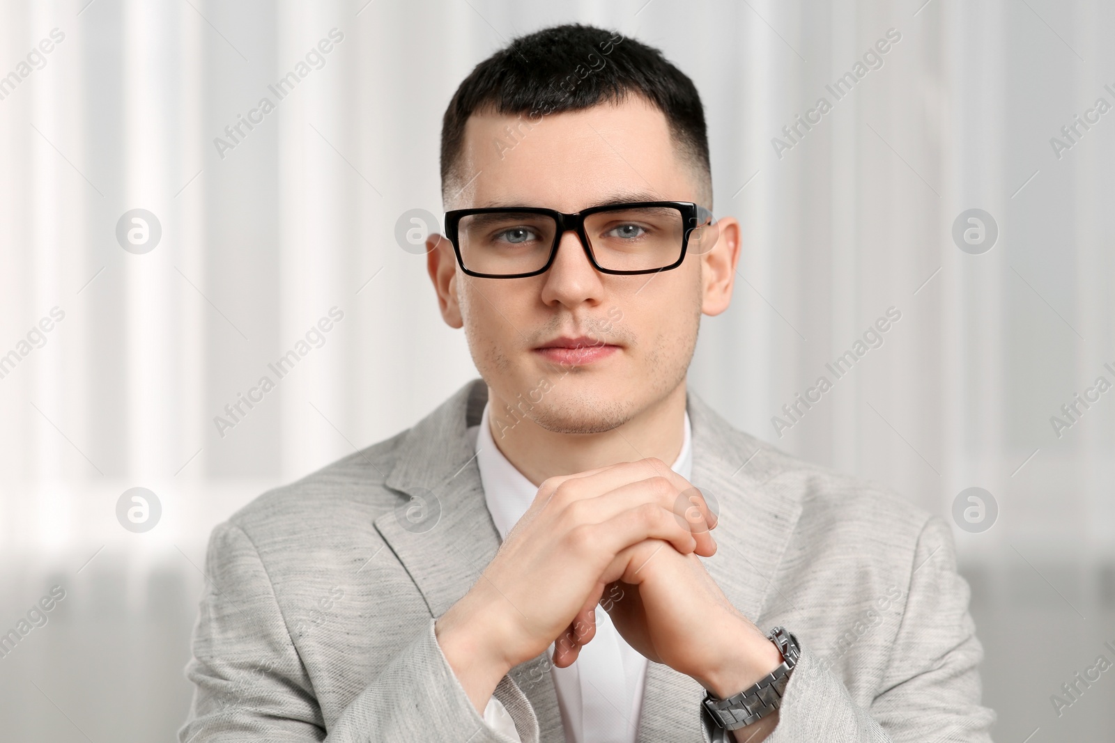 Photo of Young man having online video call indoors, view from web camera