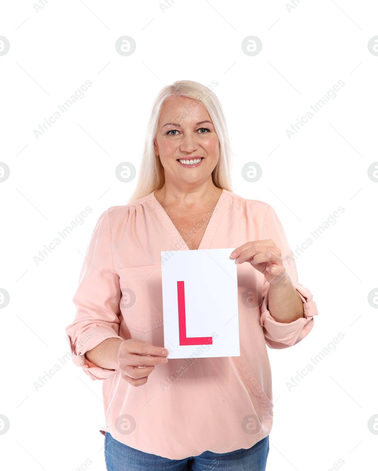 Photo of Happy mature woman with L-plate on white background. Getting driving license