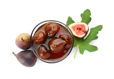 Bowl of tasty sweet jam, fresh figs and green leaf isolated on white, top view