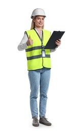 Engineer in hard hat holding clipboard and showing thumb up on white background