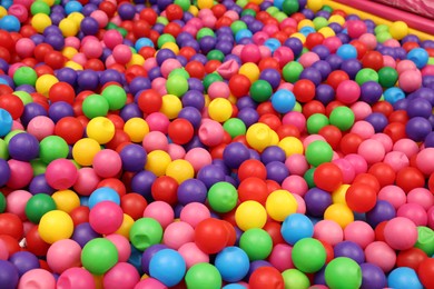 Photo of Many colorful balls as background. Kid's playroom