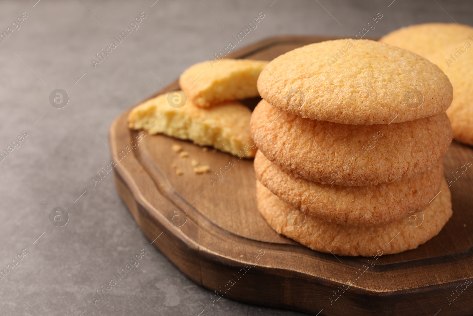 Photo of Delicious Danish butter cookies on grey table, closeup