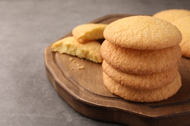 Photo of Delicious Danish butter cookies on grey table, closeup