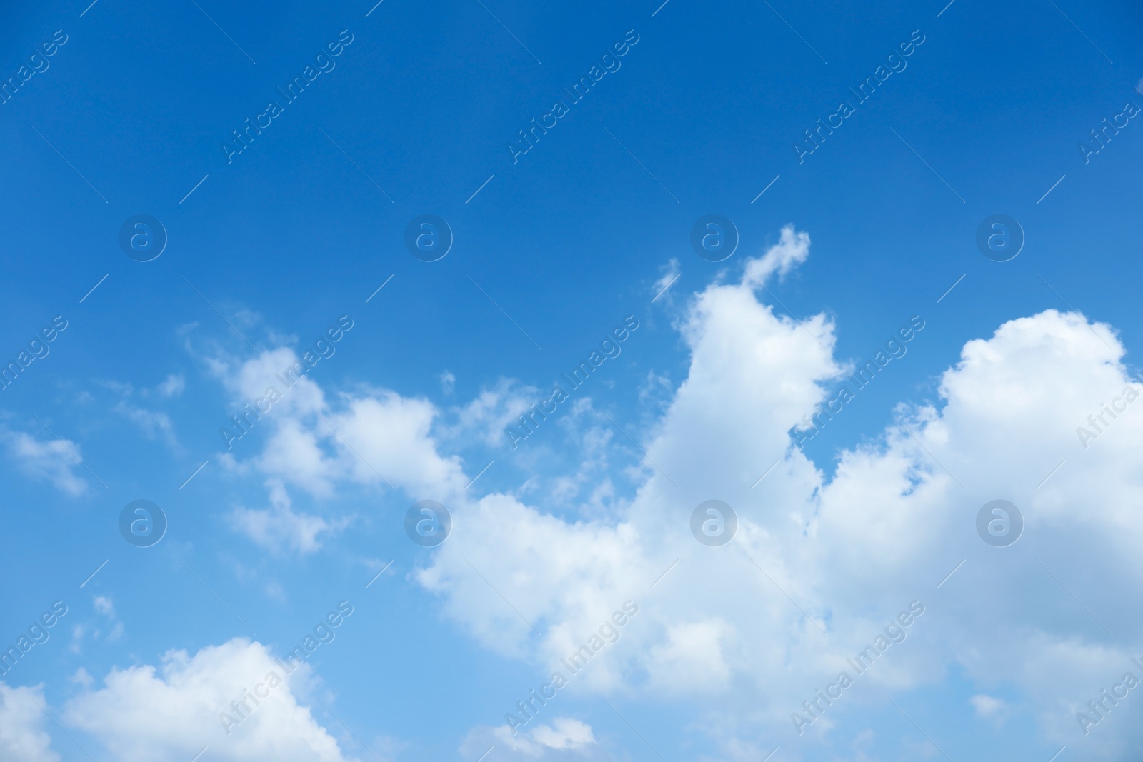 Photo of View of beautiful blue sky with fluffy clouds