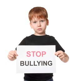 Boy holding sign with phrase Stop Bullying on white background