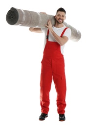 Photo of Male worker with rolled carpet on white background