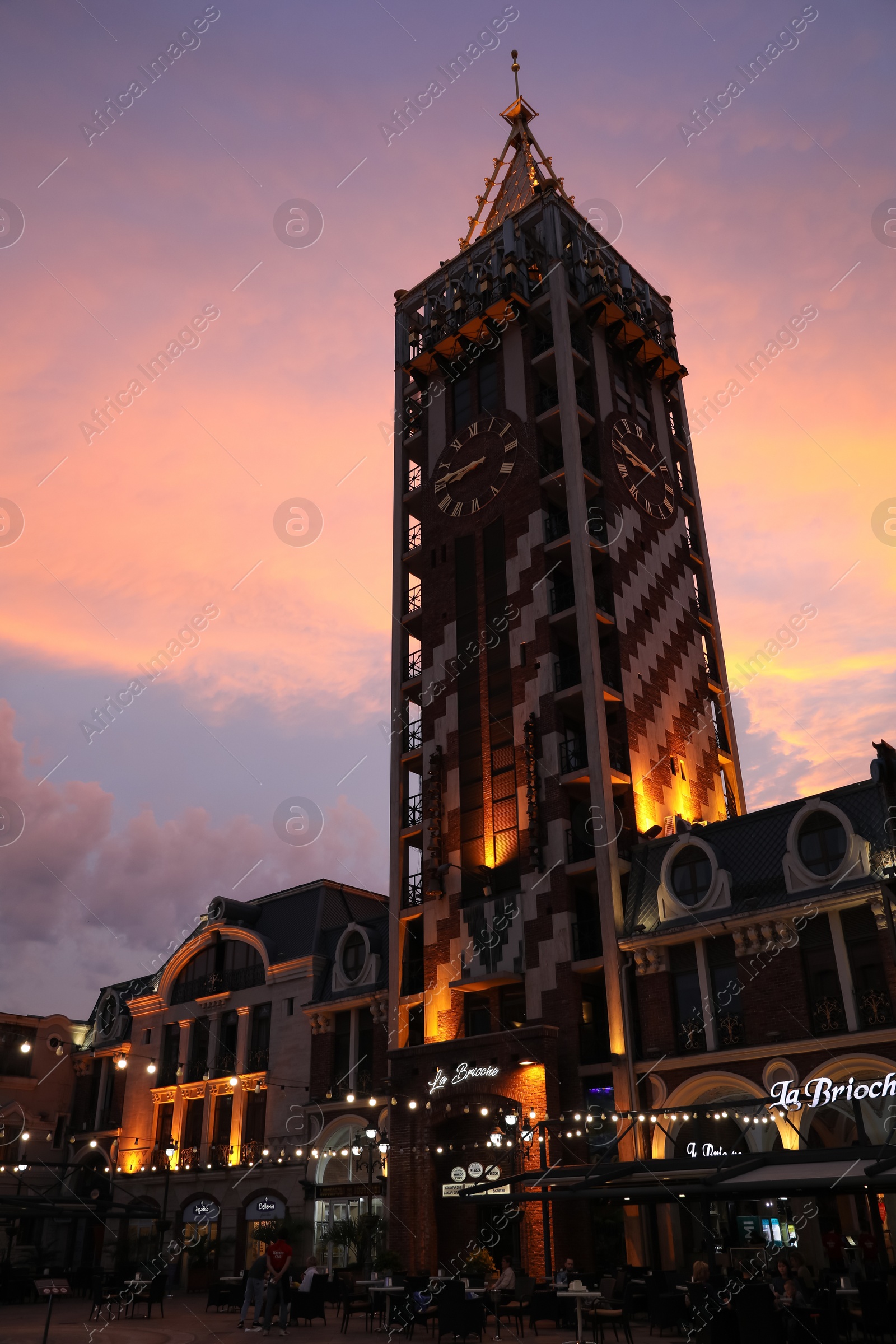 Photo of BATUMI, GEORGIA - MAY 31, 2022: Beautiful Piazza Boutique Hotel against colorful twilight sky