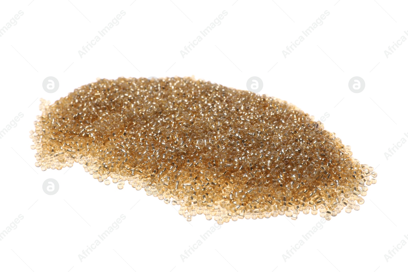Photo of Pile of golden beads isolated on white
