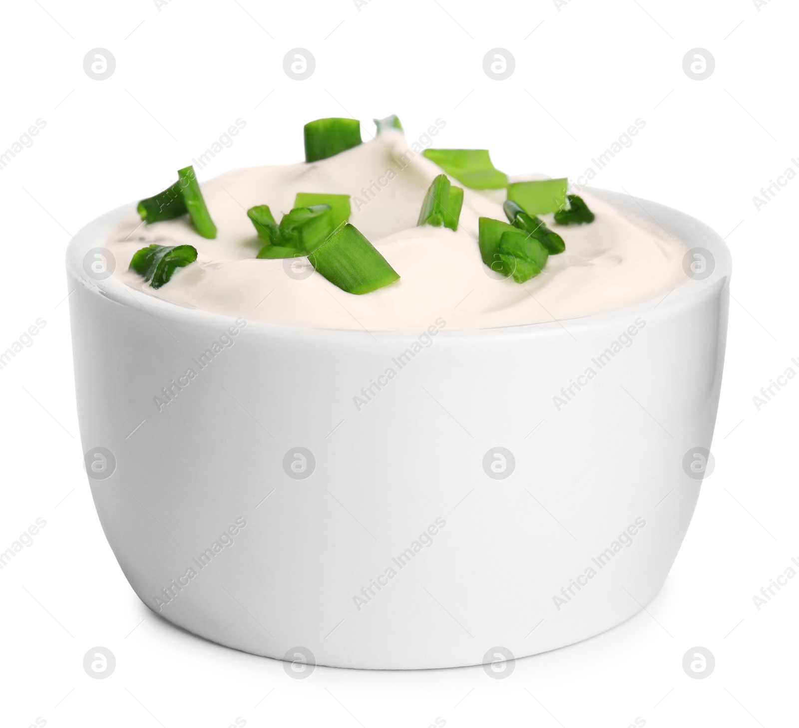 Photo of Fresh sour cream with onion on white background