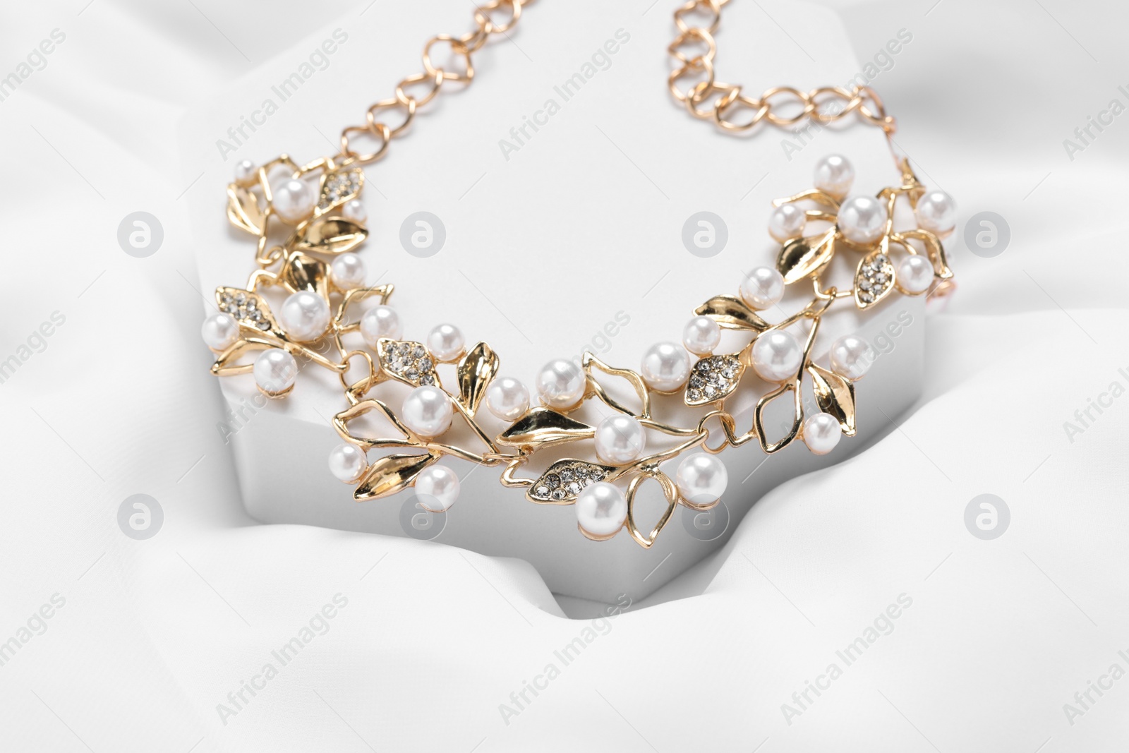 Photo of Beautiful necklace on white background. Luxury jewelry