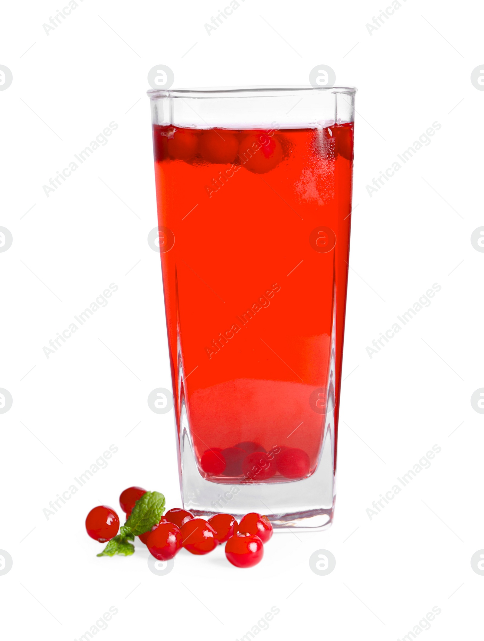 Photo of Tasty cranberry juice in glass and fresh berries isolated on white