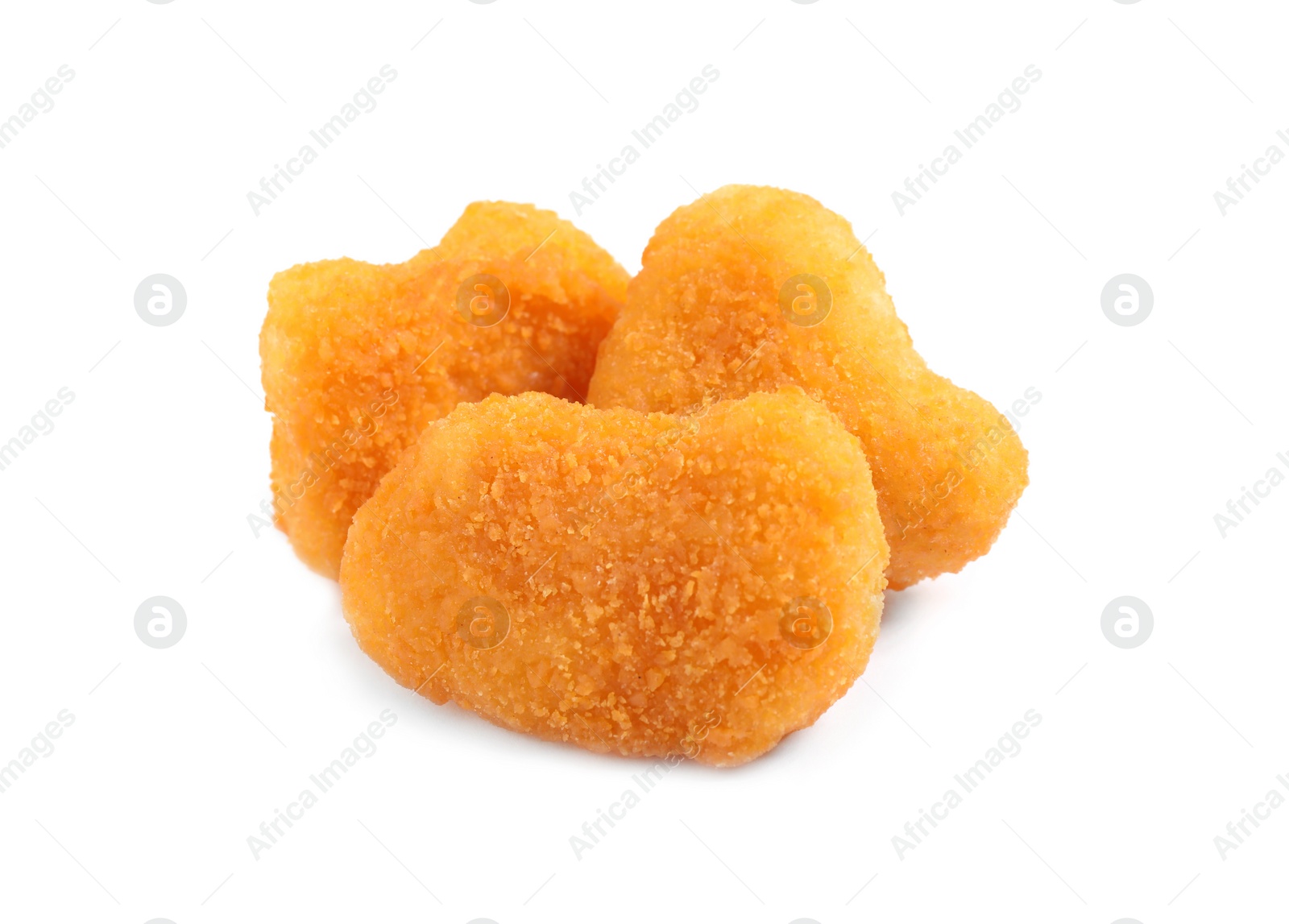 Photo of Delicious fried chicken nuggets isolated on white