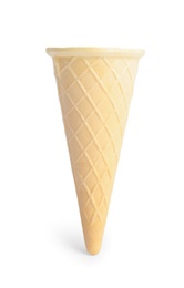 Photo of Empty wafer ice cream cone on white background