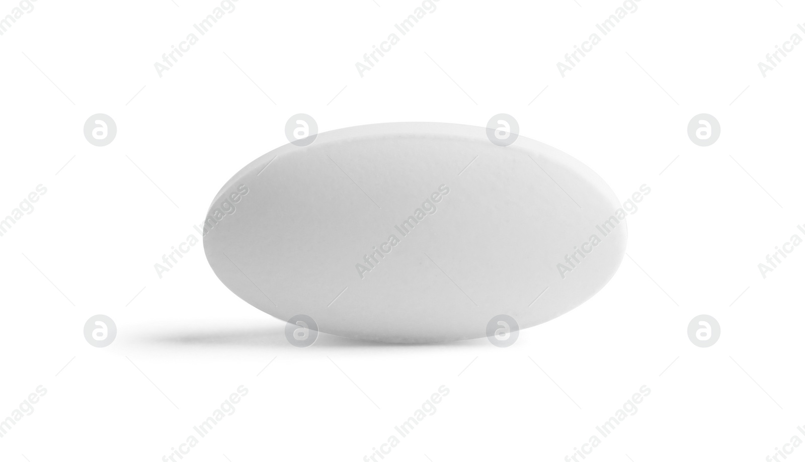 Photo of One pill on white background. Medicinal treatment