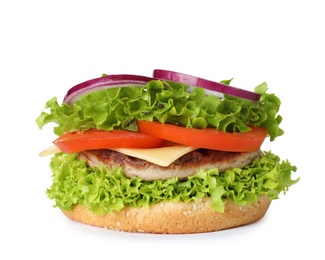 Photo of Burger bun with cutlet and vegetables isolated on white